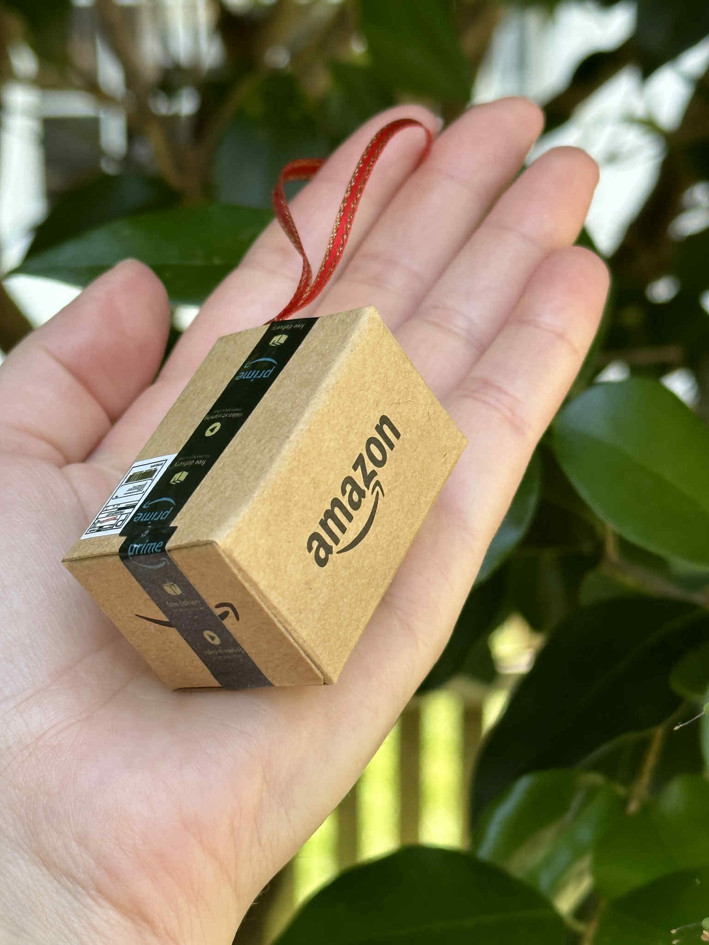 Celebrate the joy of unboxing with this quirky Amazon Box Inspired Ornament, perfect gift for online shopping lovers, playful touch to holiday, office spaces