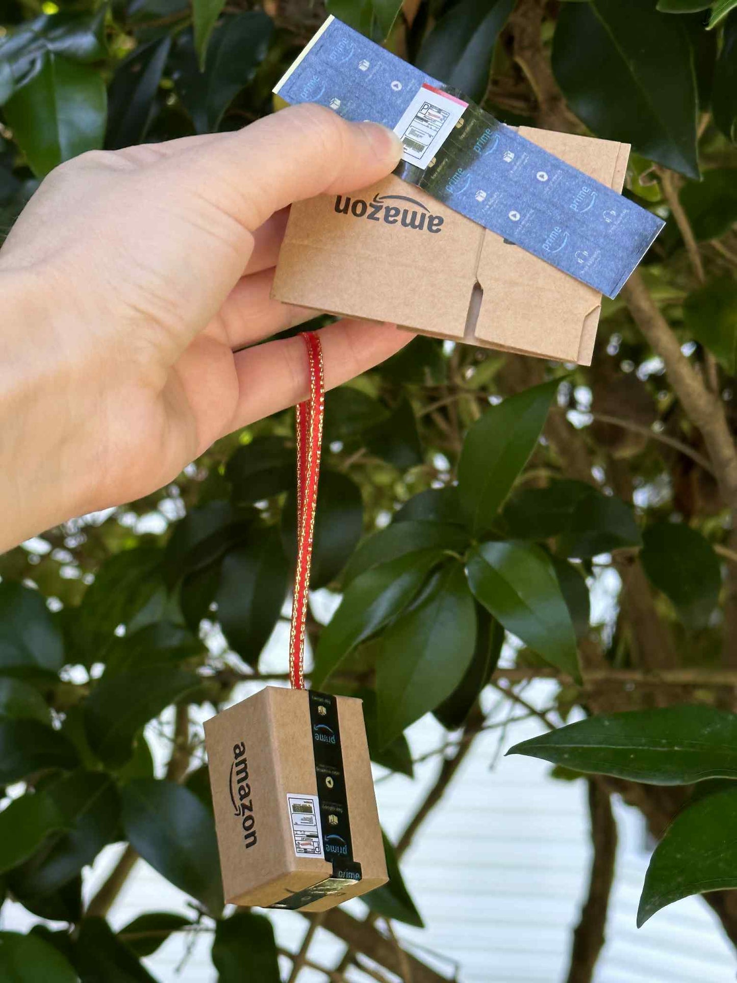Celebrate the joy of unboxing with this quirky Amazon Box Inspired Ornament, perfect gift for online shopping lovers, playful touch to holiday, office spaces
