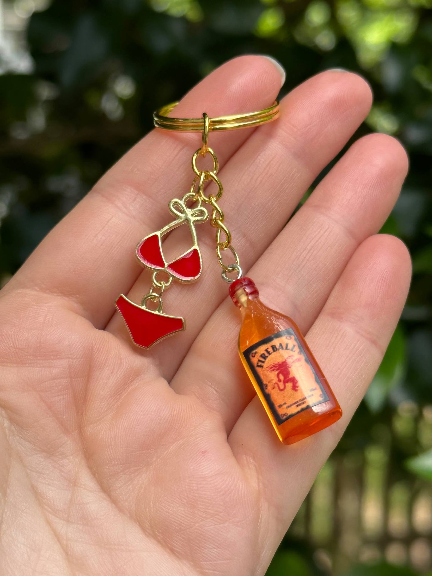 fireball keychain with red bikini metal charms bold fun gift for her