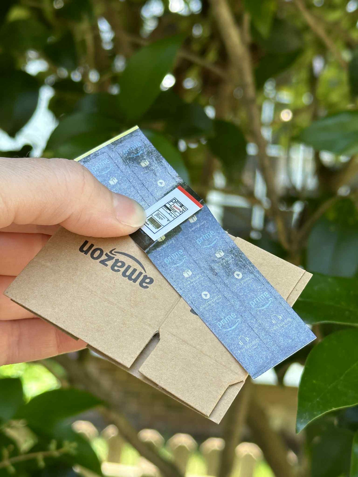 Celebrate the joy of unboxing with this quirky Amazon Box Inspired Ornament, perfect gift for online shopping lovers, playful touch to holiday, office spaces