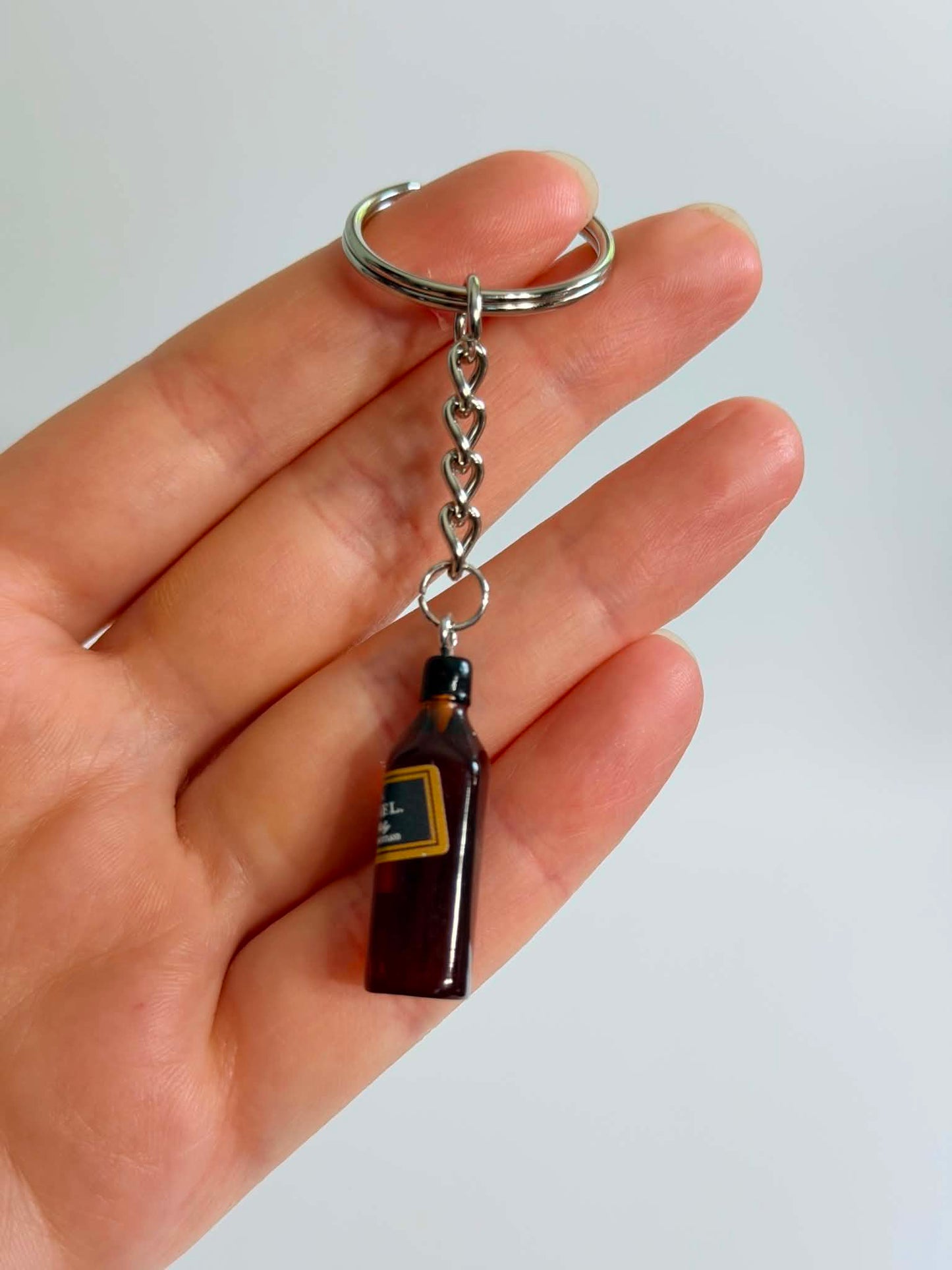 Mini black drink Bottle Keychain Accessory Design