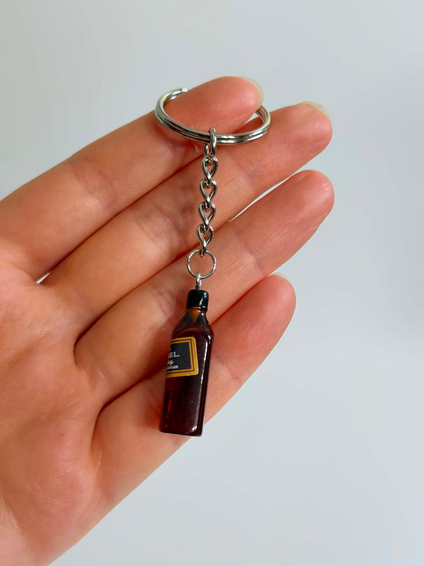 Mini black drink Bottle Keychain Accessory Design