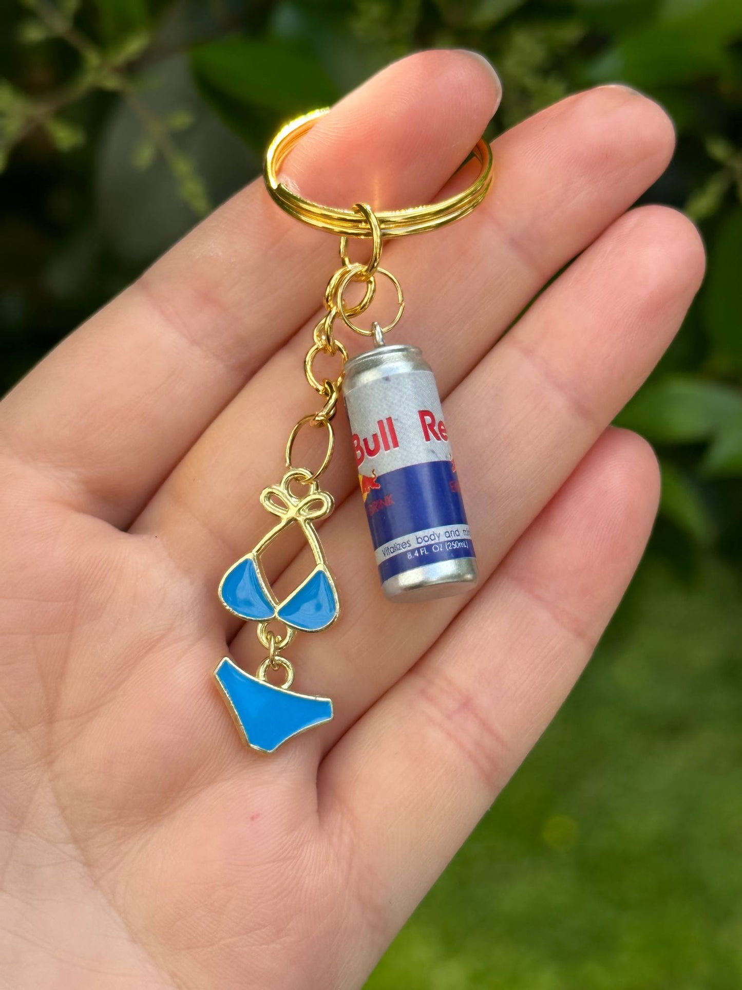 red bull and blue bikini charm keychain for party and energy lovers