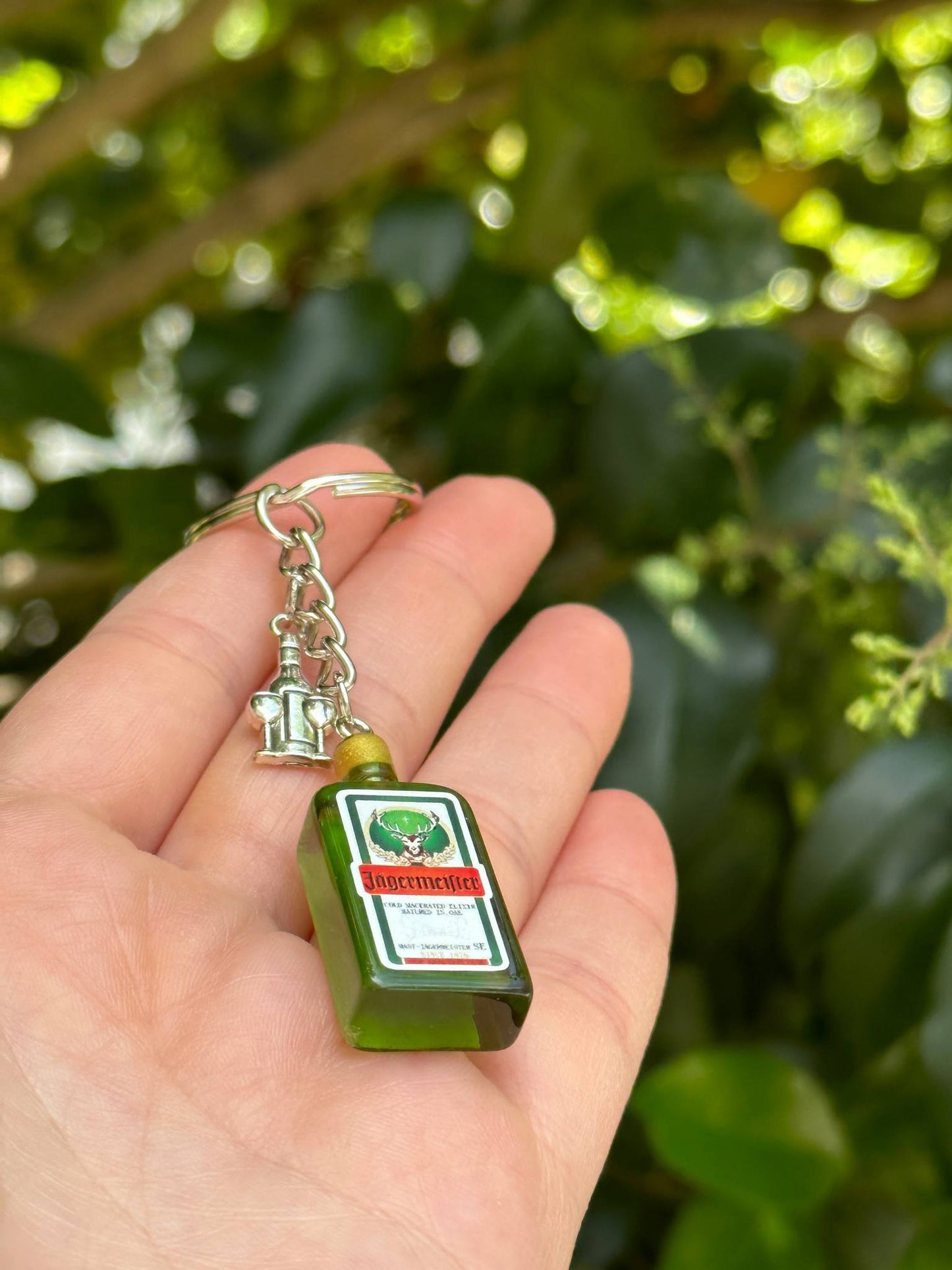mini Jägermeister keychain with cocktail glass charm for liquor lovers