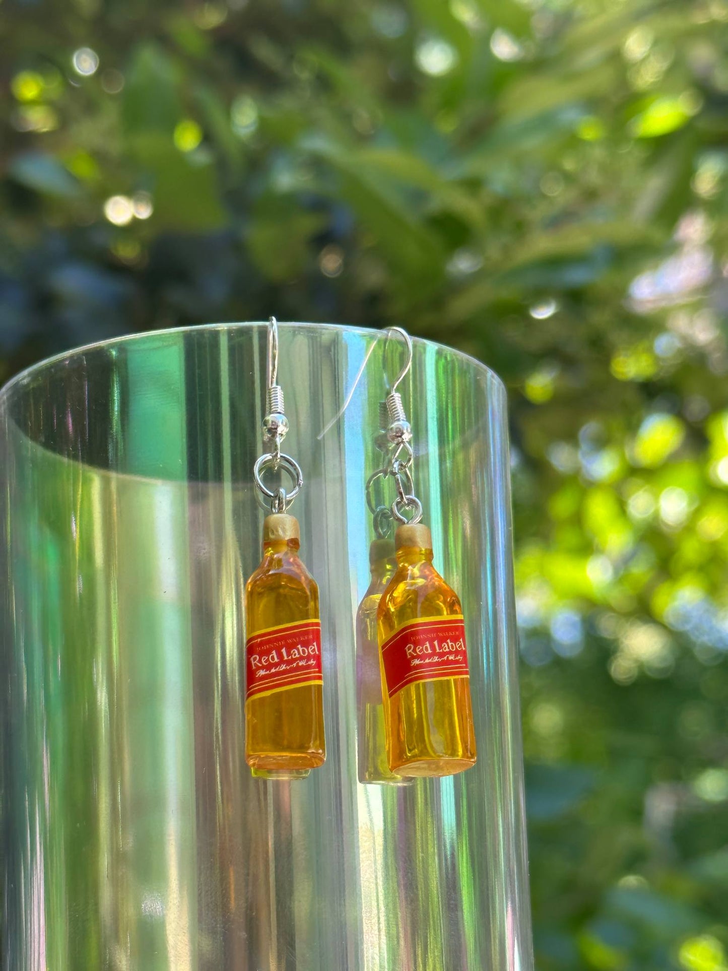 Mini whiskey R.L. bottle earring