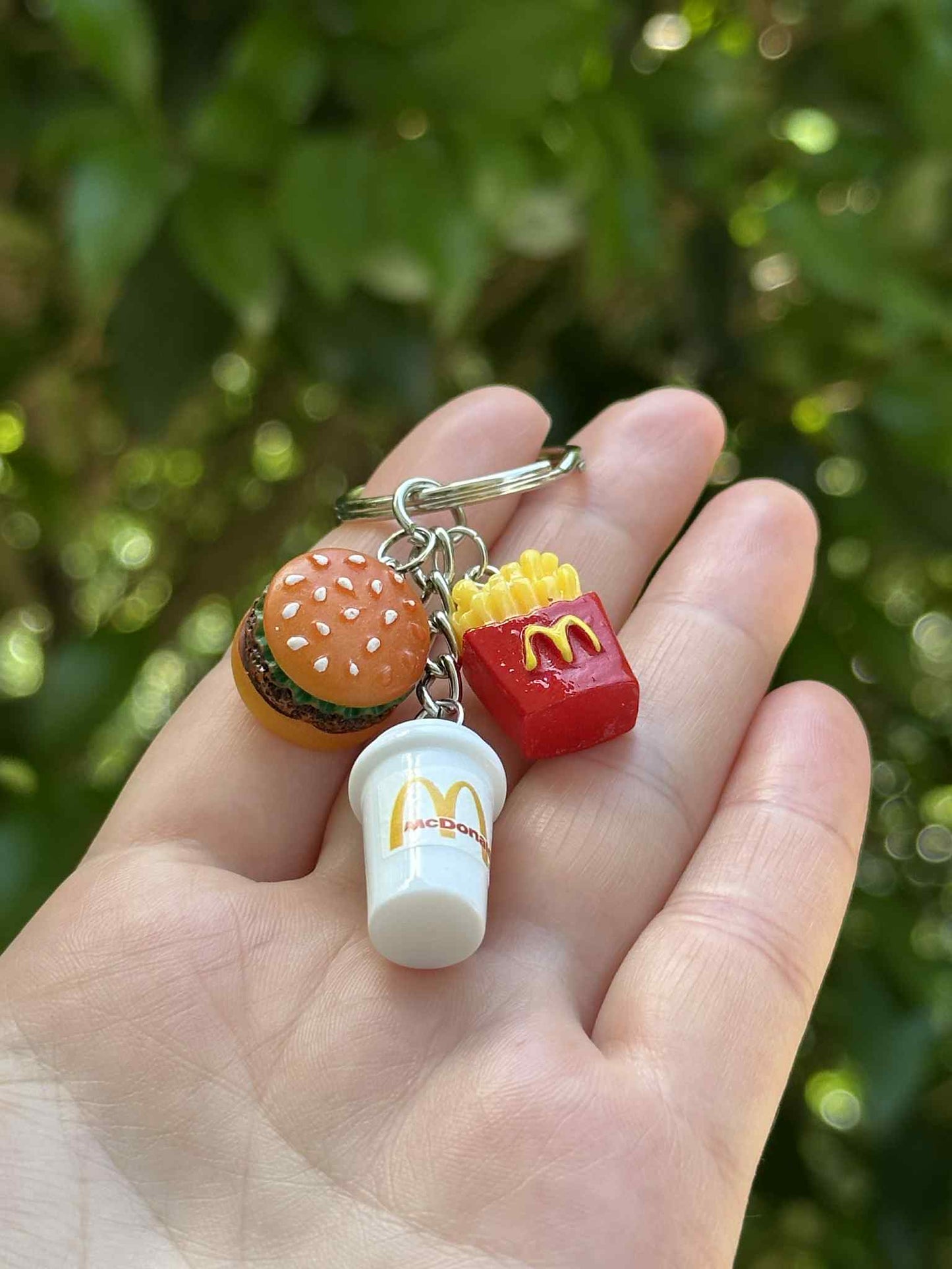Mini fast food keychain set with hamburger, fries, and soda charms