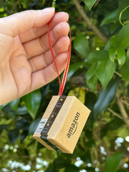 Celebrate the joy of unboxing with this quirky Amazon Box Inspired Ornament, perfect gift for online shopping lovers, playful touch to holiday, office spaces