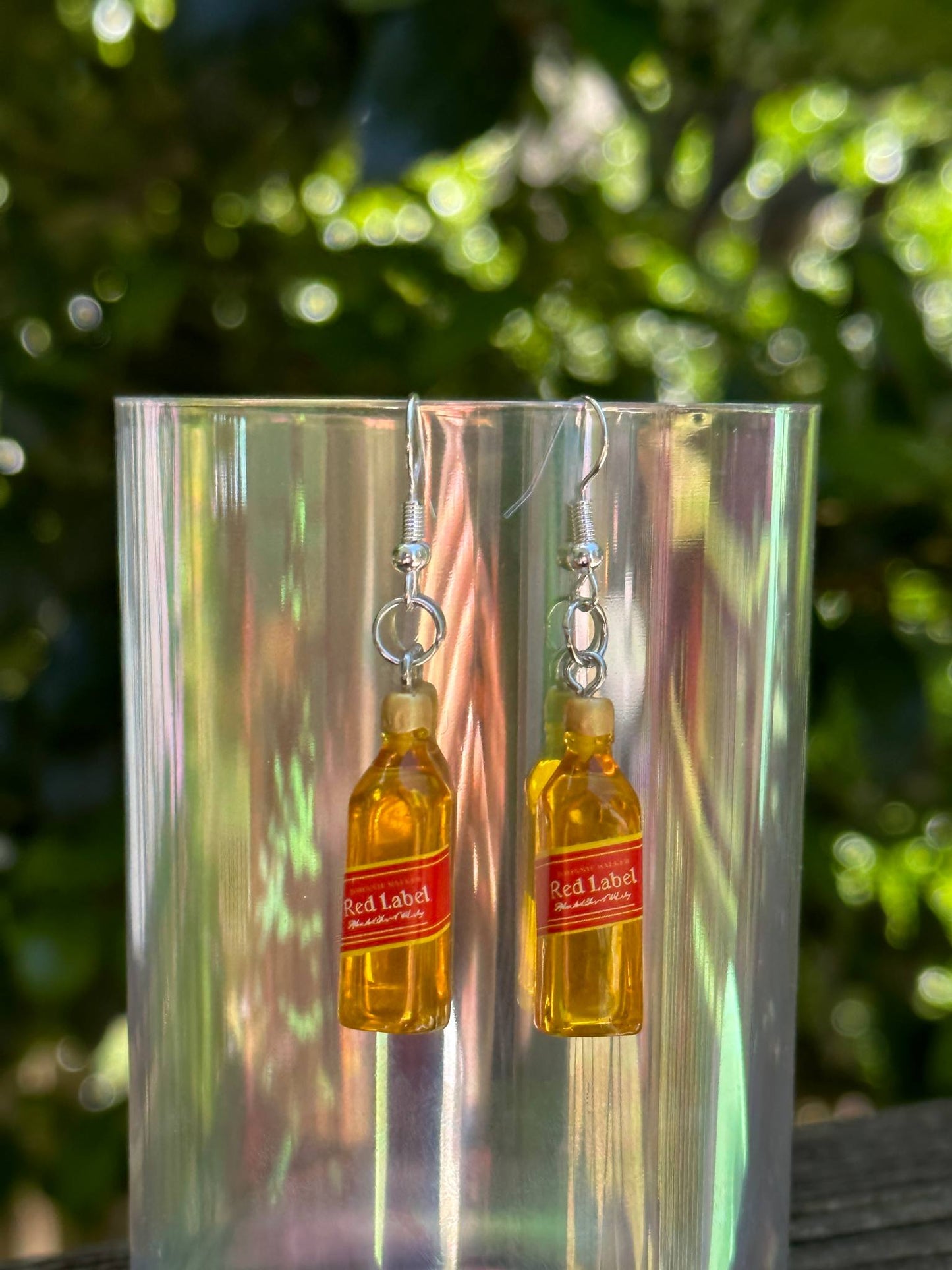 Mini whiskey R.L. bottle earring