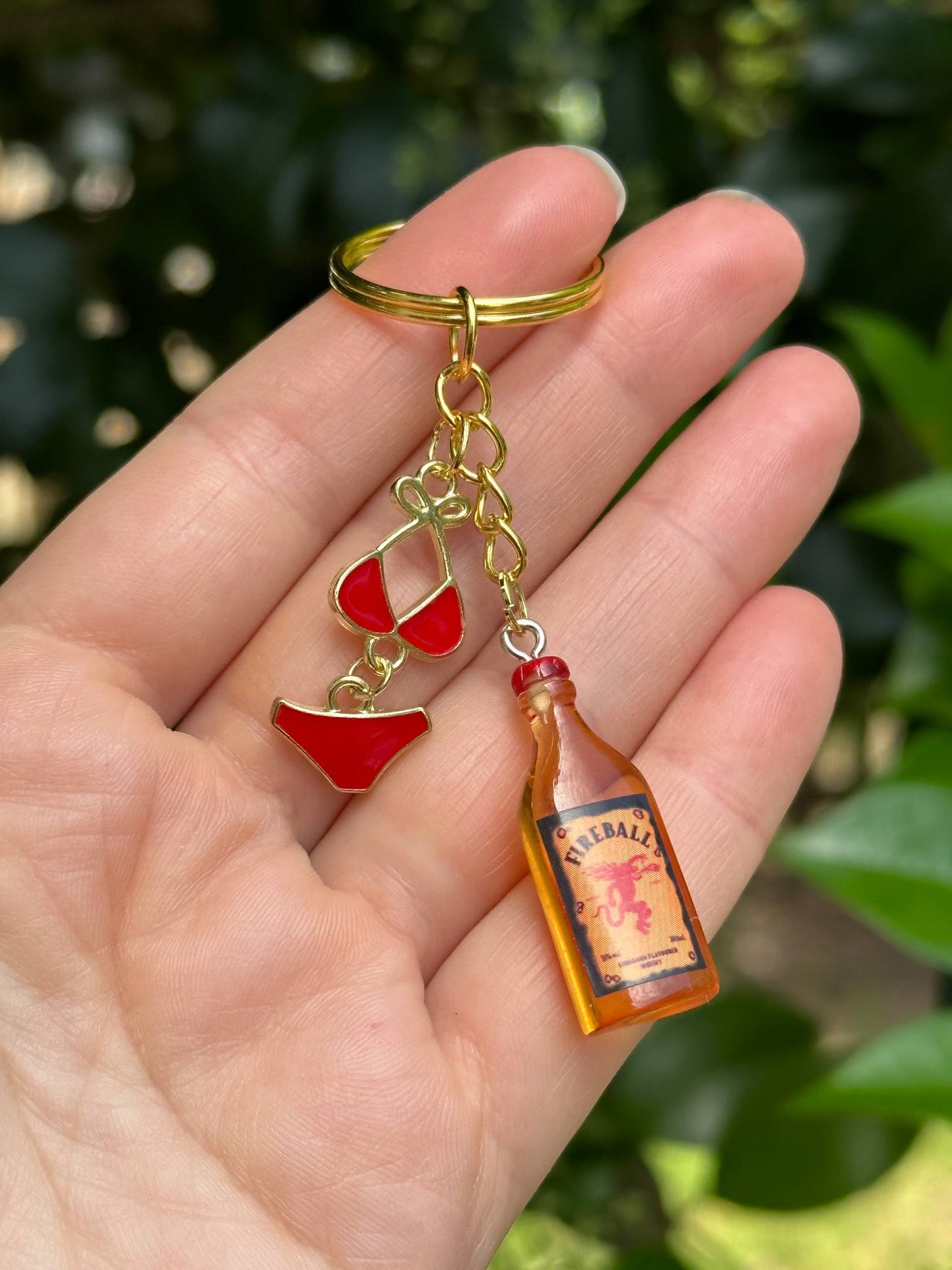 fireball keychain with red bikini metal charms bold fun gift for her